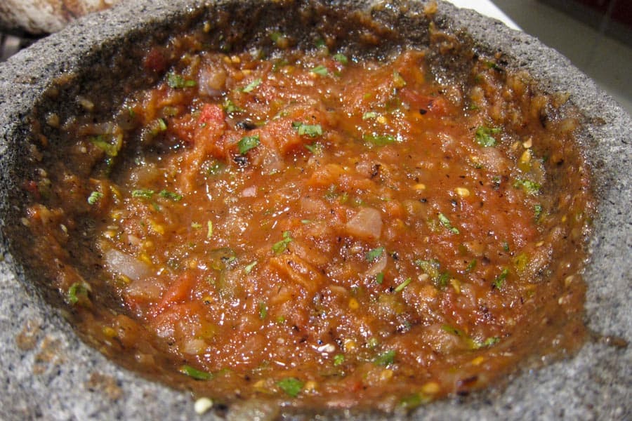 Roast salsa made in a pestle and mortar