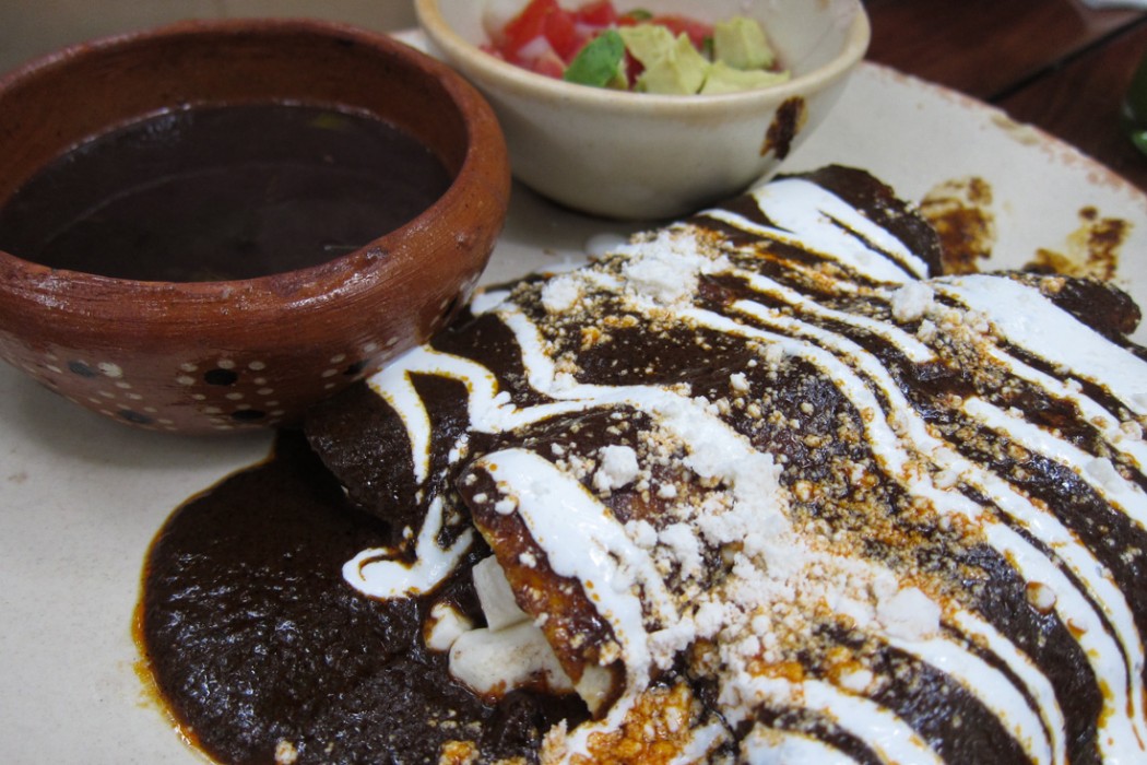 Panela enchiladas with mole sauce