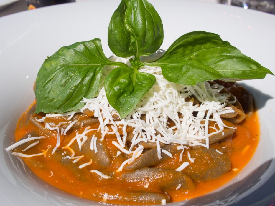 Dark orecchiette with tomato and caciocavallo cheese at Ristorante Porta Nova in Ostuni