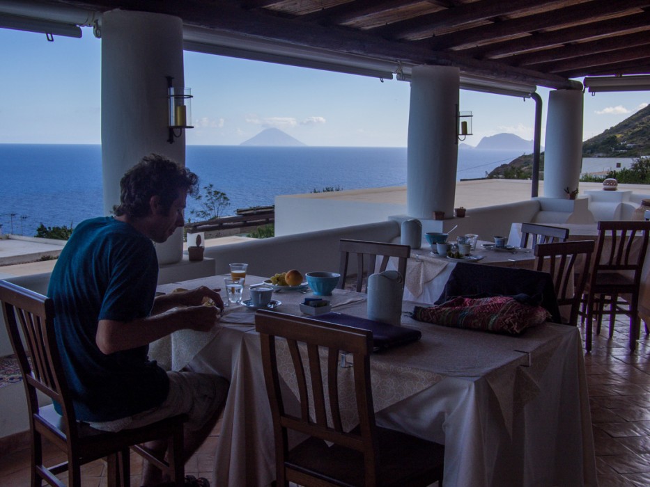 The breakfast terrace at Hotel Principe di Salina with views of Stromboli and Panarea