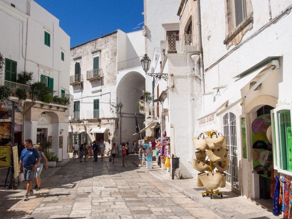 Ostuni's main street with shops, Puglia, Italy