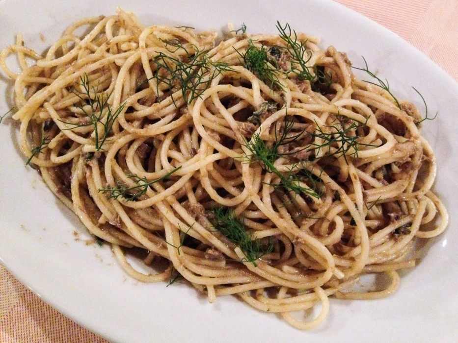 Spaghetti with a pesto-like sauce of capers, mint, parsley, and pecorino at A’Lumeredda, Malfa