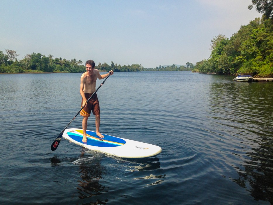 Simon stand up paddle boarding at GreenHouse