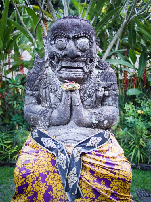 Balinese offering on statue, Ubud