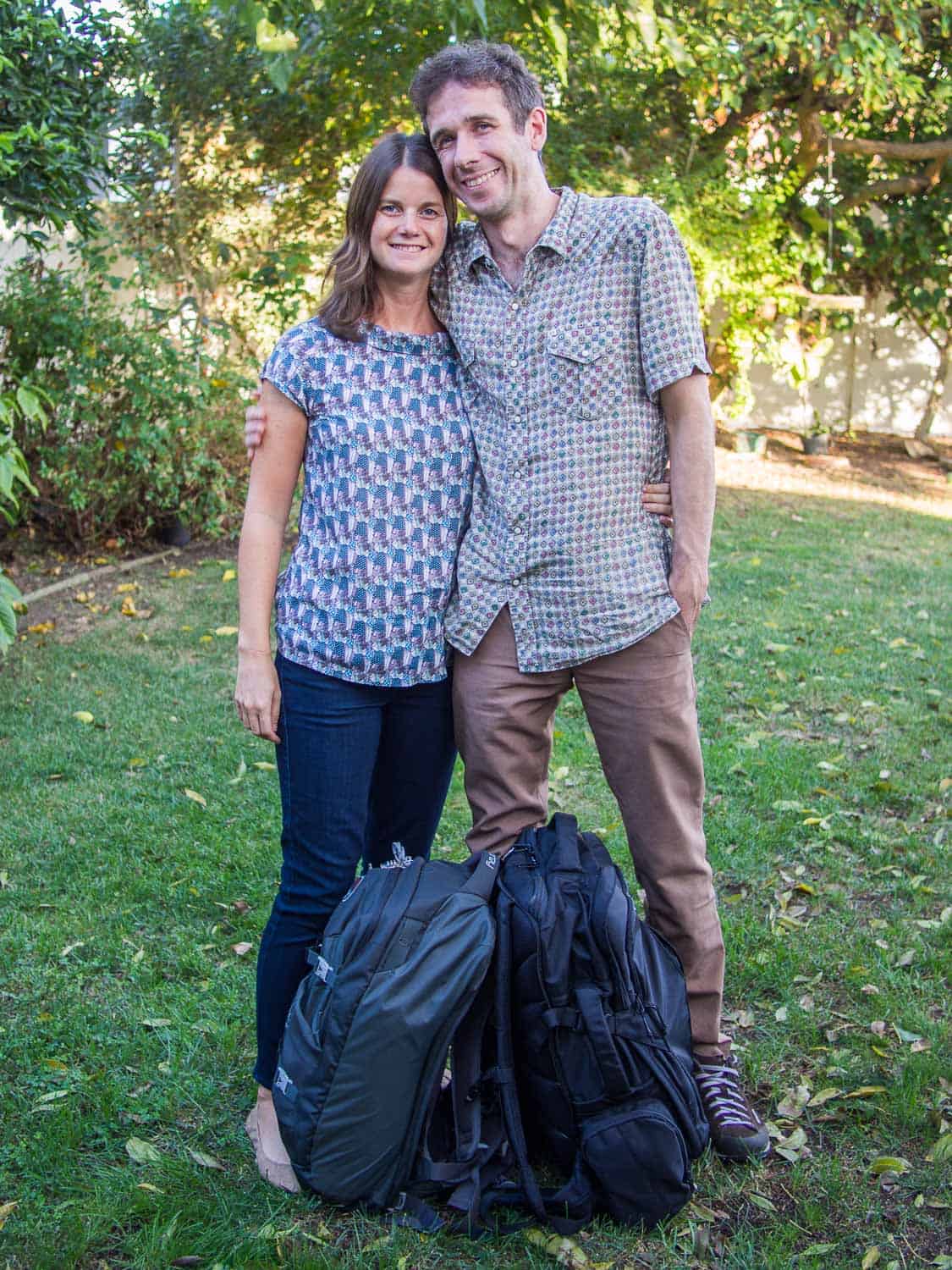 Erin and Simon of Never Ending Voyage with their carry-on backpacks