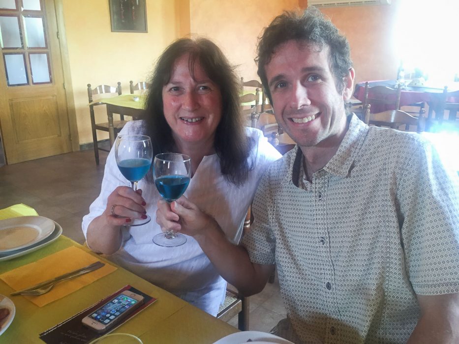 Simon and his mum drinking blue wine 