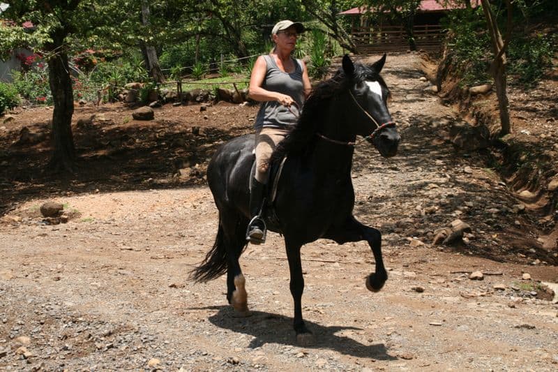 Brenda riding Augustus the stallion, Establos San Rafael