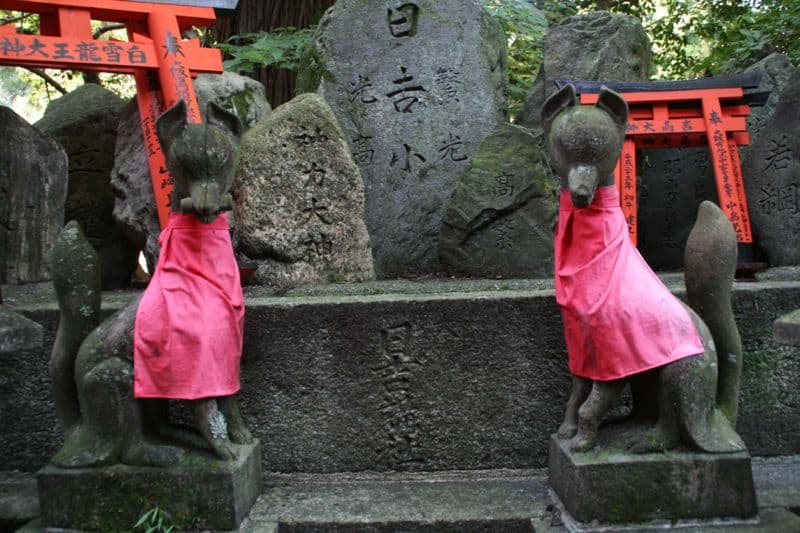 Guardian foxes at Fushimi Inari Shrine, Kyoto