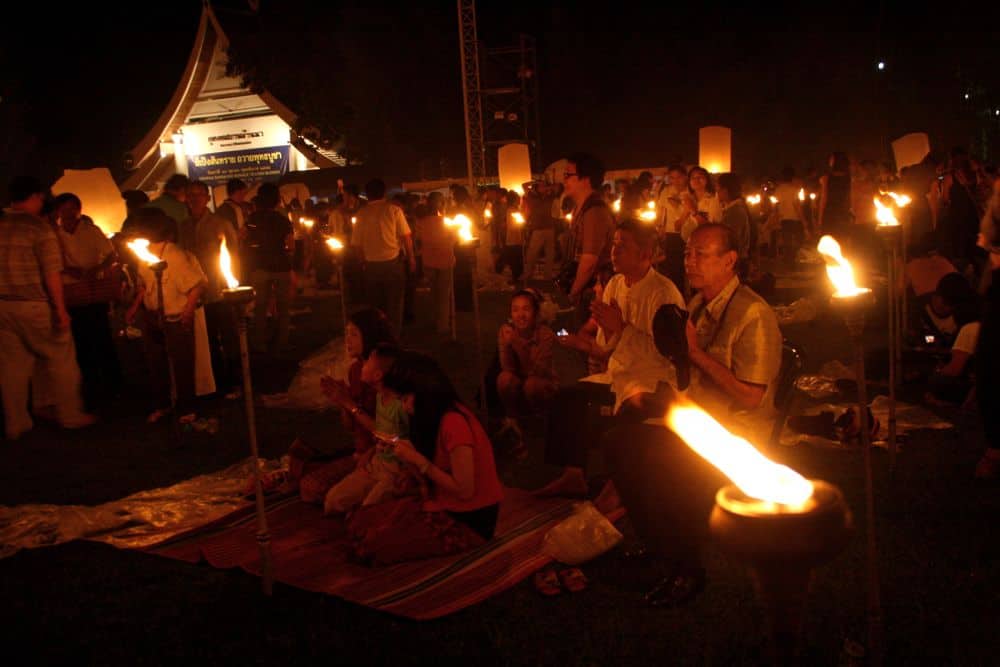 Praying family at Yee Peng