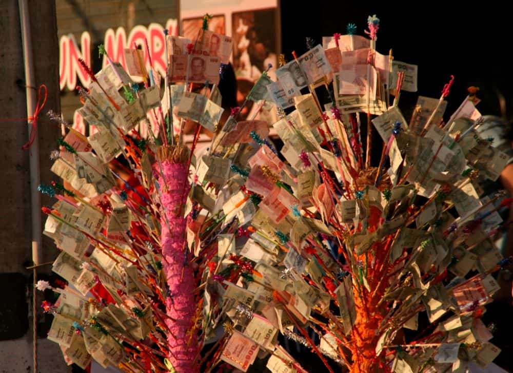 Money offering to monks