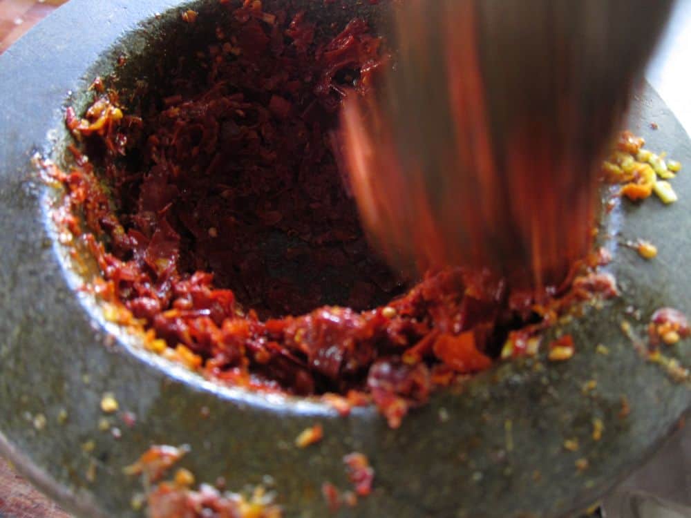 Pounding curry paste