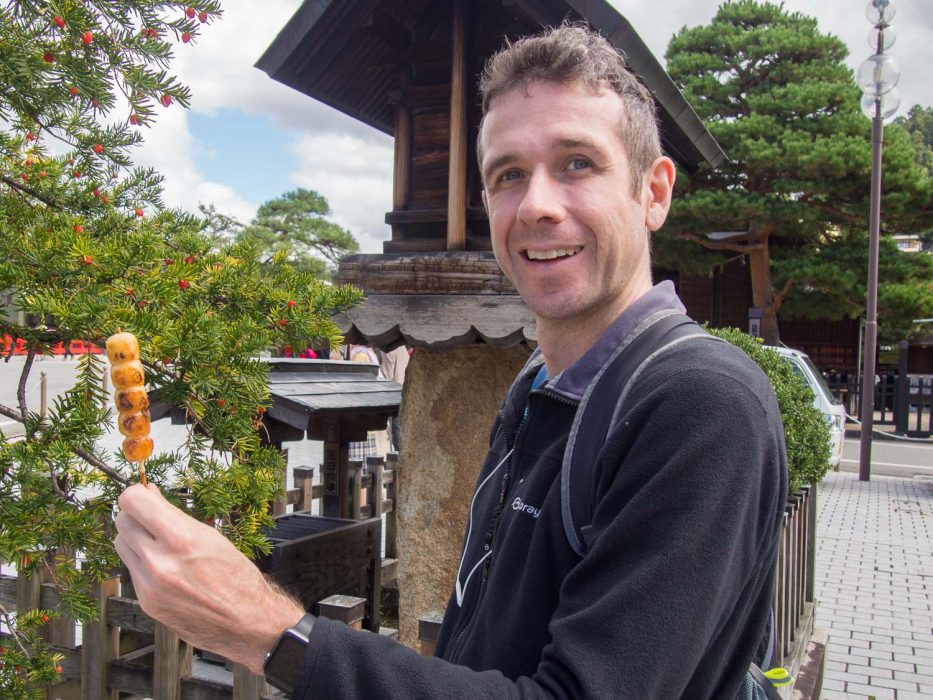 Mitarashi dango - a vegetarian Japanese food served on the street in Takayama, Japan