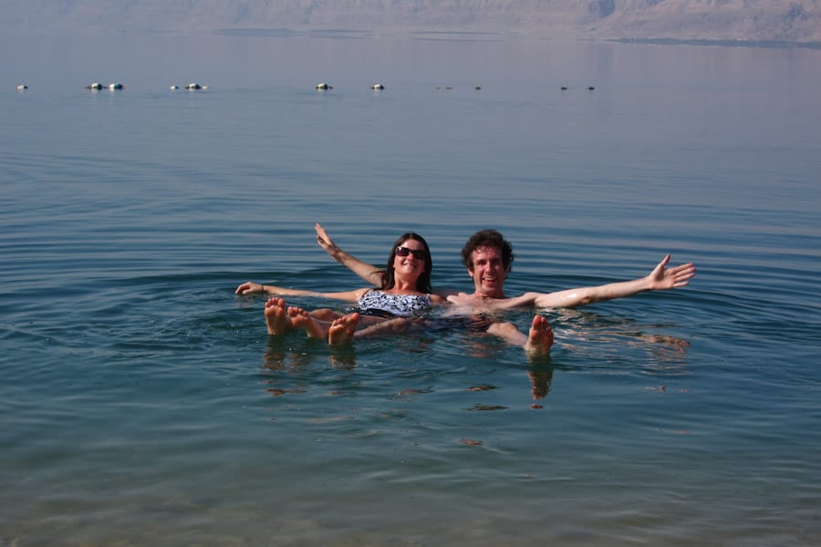 Simon and Erin floating in the Dead Sea, Jordan