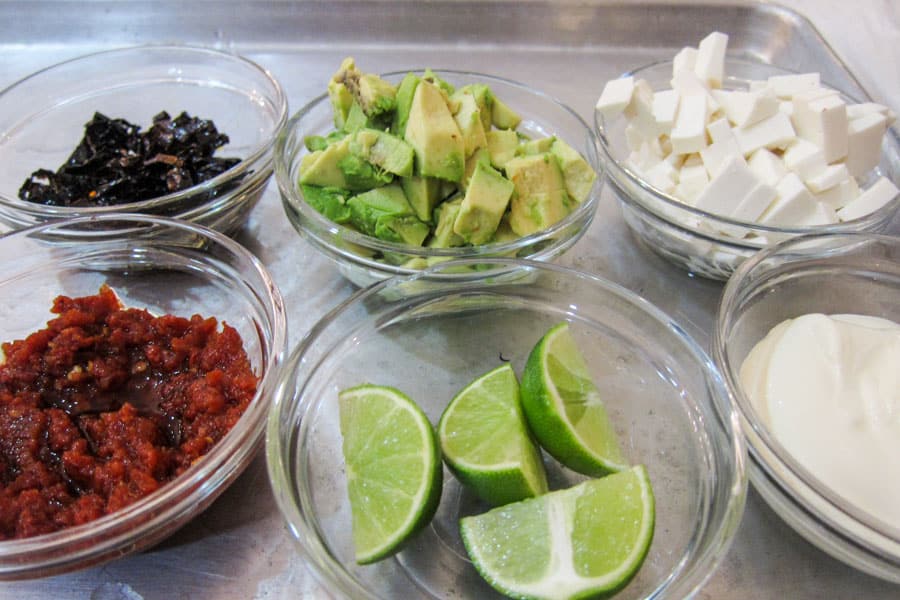 Tortilla soup toppings with two types of chile