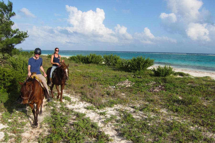 Riding along beach at Maroma