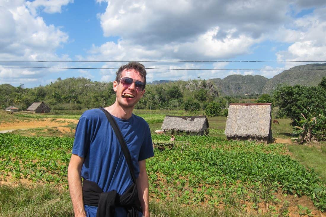 Simon smoking a cigar at tobacco farm in Vinales