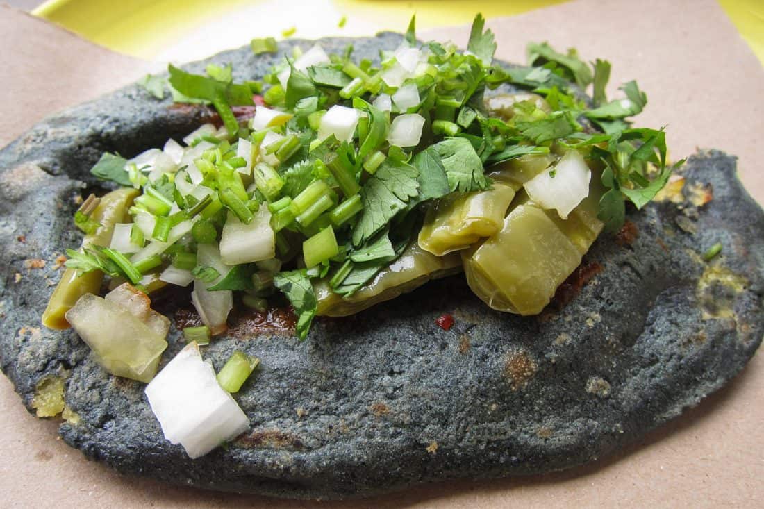 Blue corn tlacoyo with fava beans