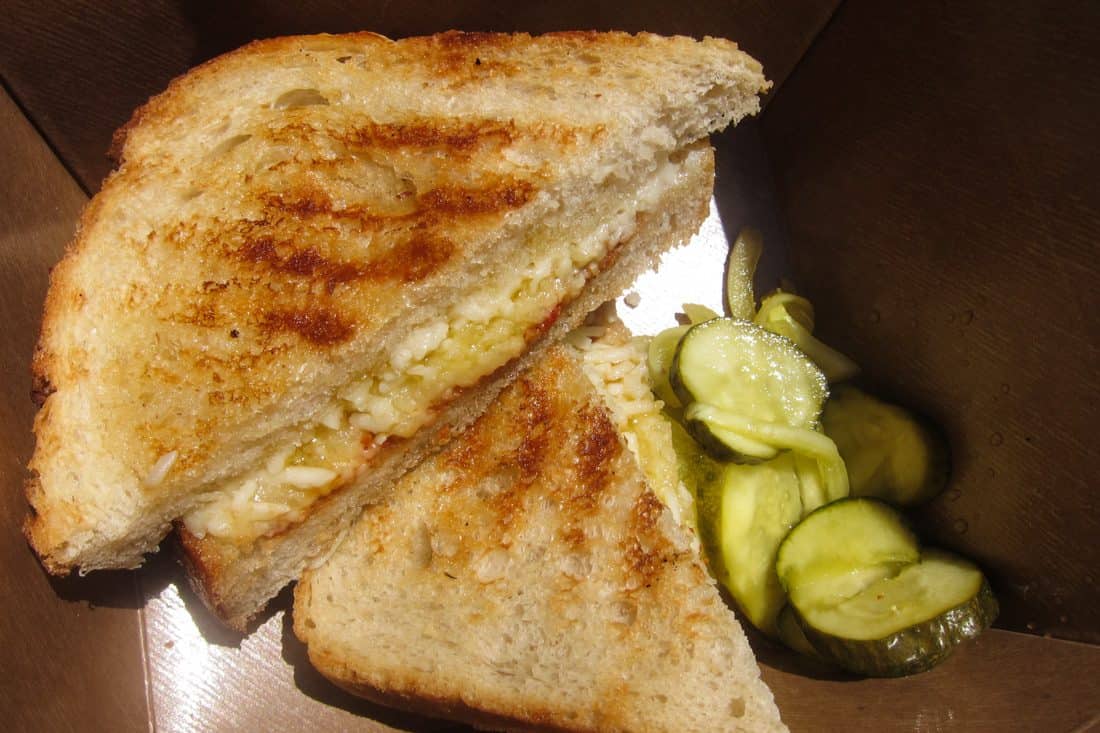 Grilled cheese sandwich and pickles from Cowgirl Sidekick