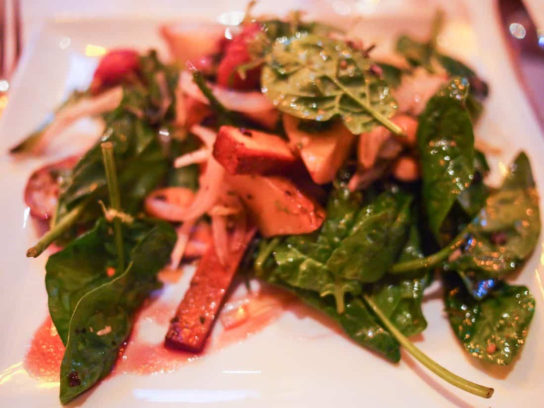 Wilted spinach salad with smoked tofu at Millennium