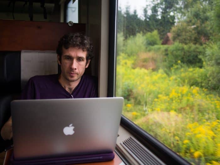 Simon working on a train through Austria