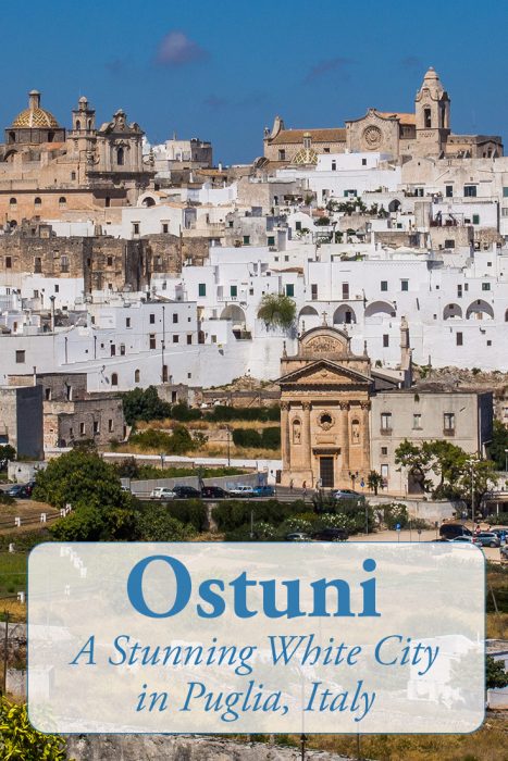Ostuni, Puglia is one of the most beautiful towns in Italy with a maze of whitewashed buildings perched on a hilltop and views of olive groves and the sea. Click through for more Ostuni photos and travel tips.
