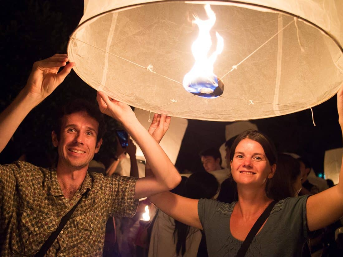 Erin & Simon releasing a lantern at Yi Peng, Chiang Mai