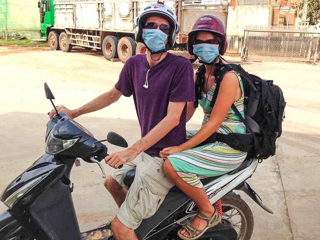 Wearing masks on motorbike, Cambodia