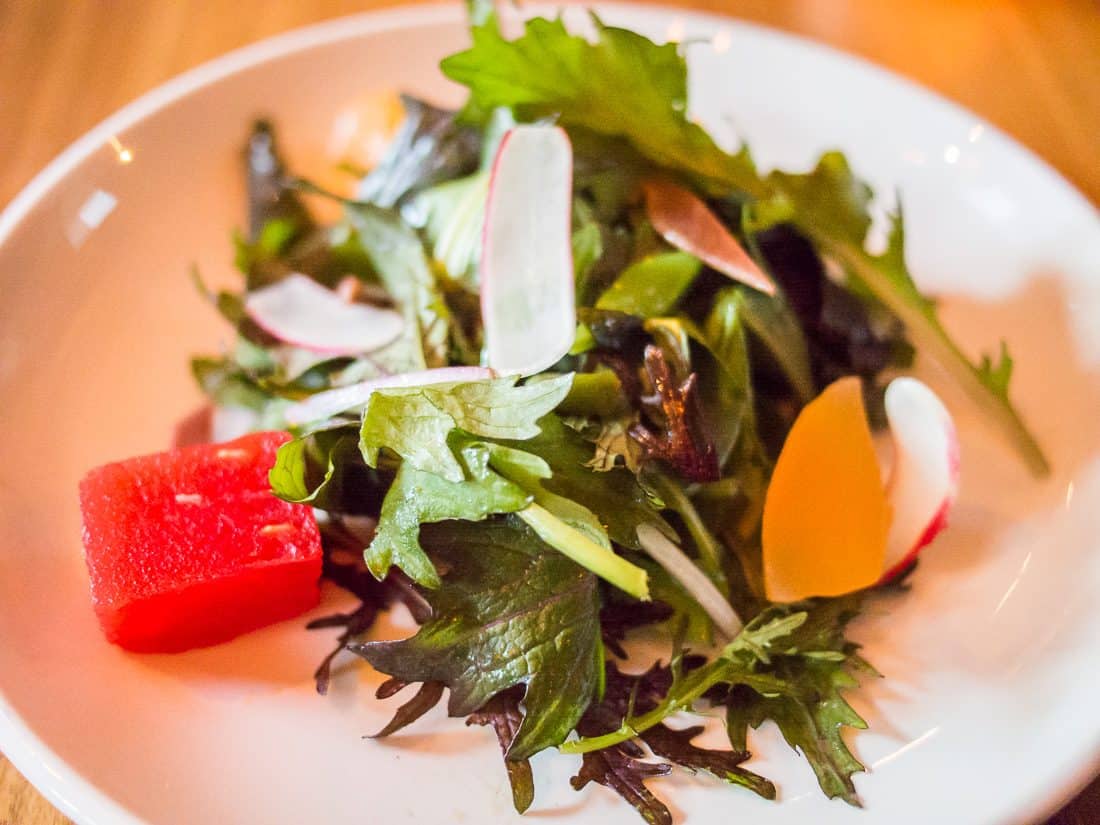 melon and mustard greens salad  at Natural Selection