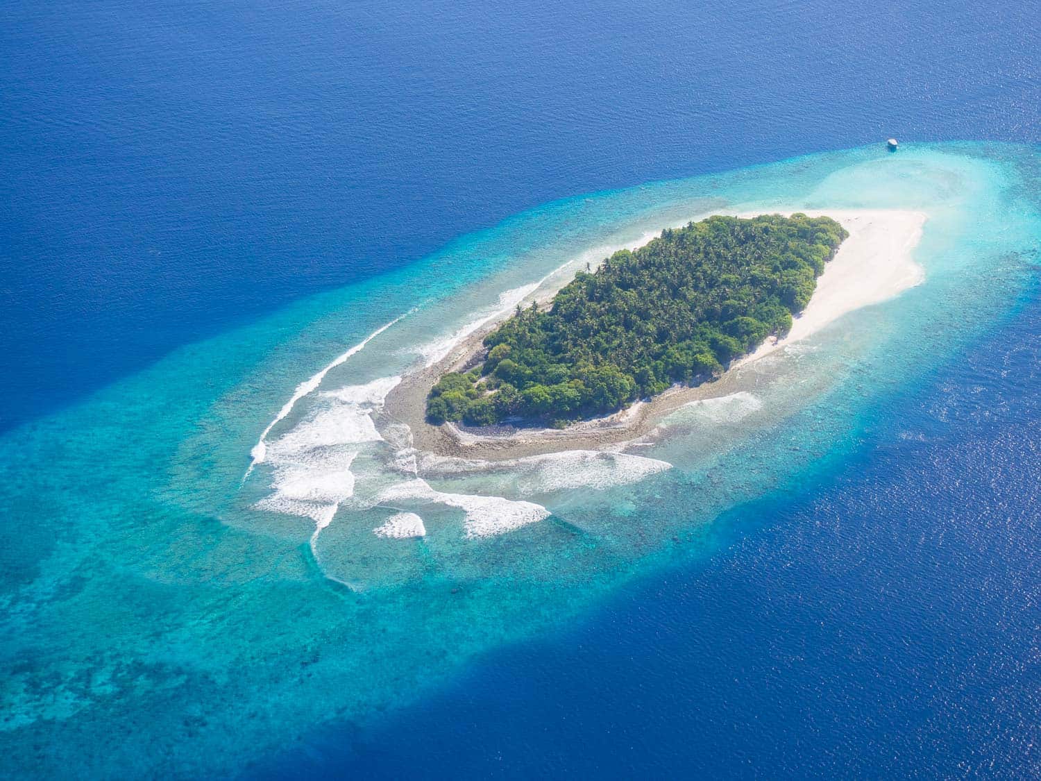 The Maldives from above. Arriving at Reethi Beach Resort by seaplane. 