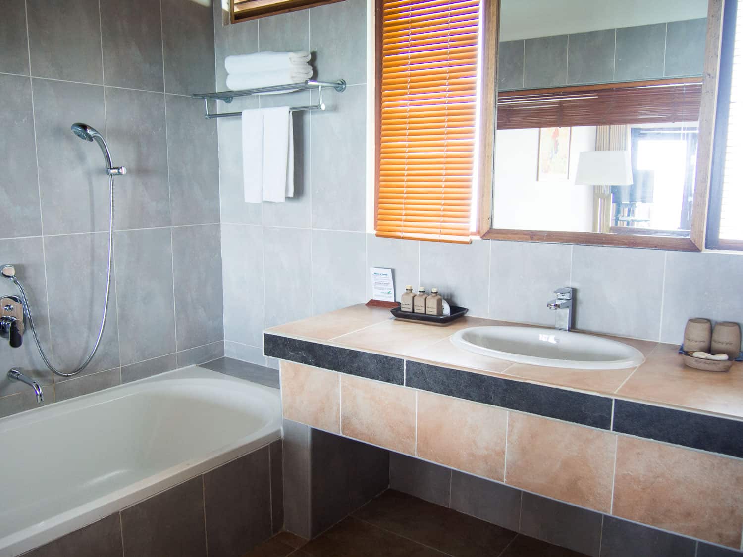 Water villa bathroom at Reethi Beach Resort