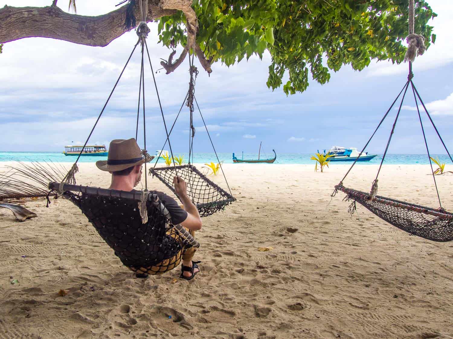 Hammocks on the main beach ion Fulidhoo, Maldives