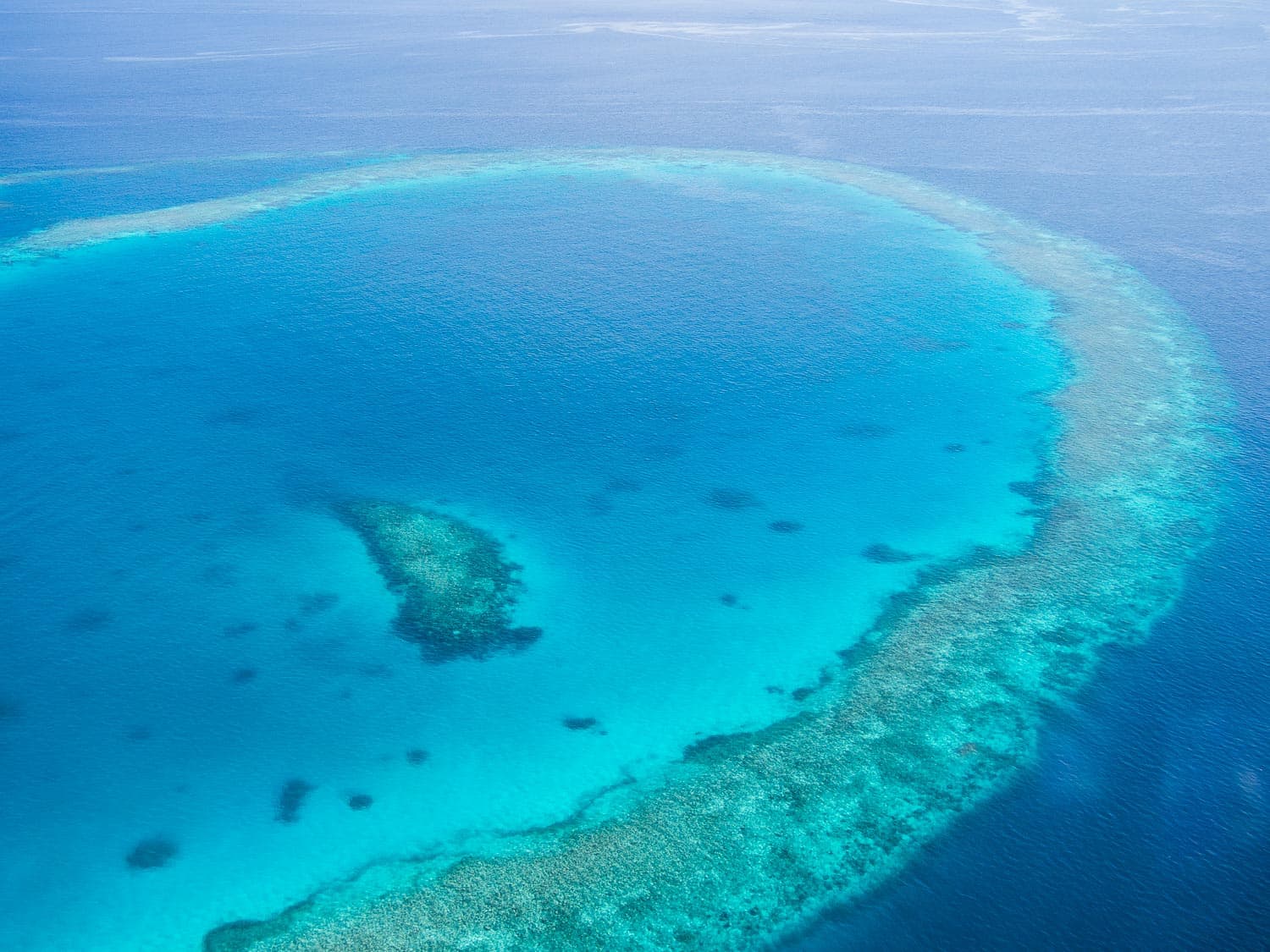 The Maldives from above. Arriving at Reethi Beach Resort by seaplane. 