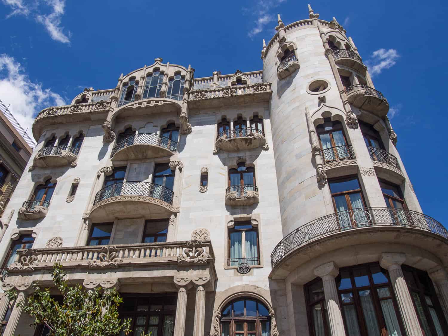 Moorish windows and medieval tower of Casa Fuster, Barcelona, Spain