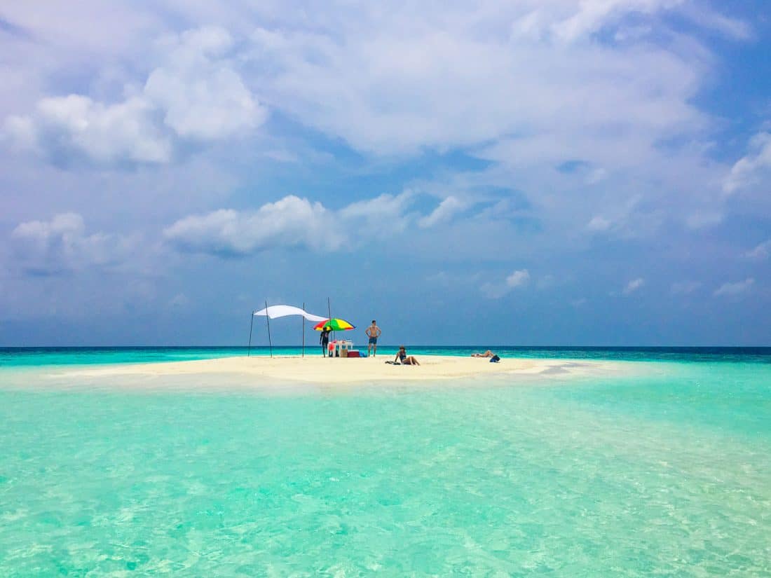 Learn how to plan a trip to the Maldives on a budget. A snorkelling trip in Maafushi including lunch on this sandbank only cost $25!