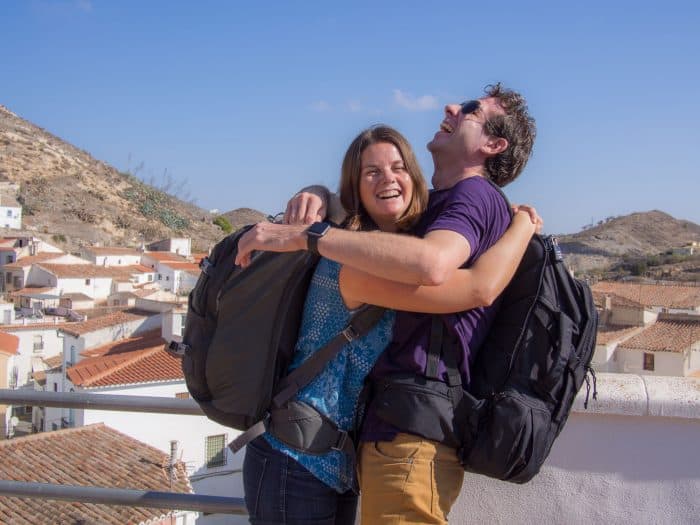 Erin and Simon with carry on backpacks in Lubrin, Spain