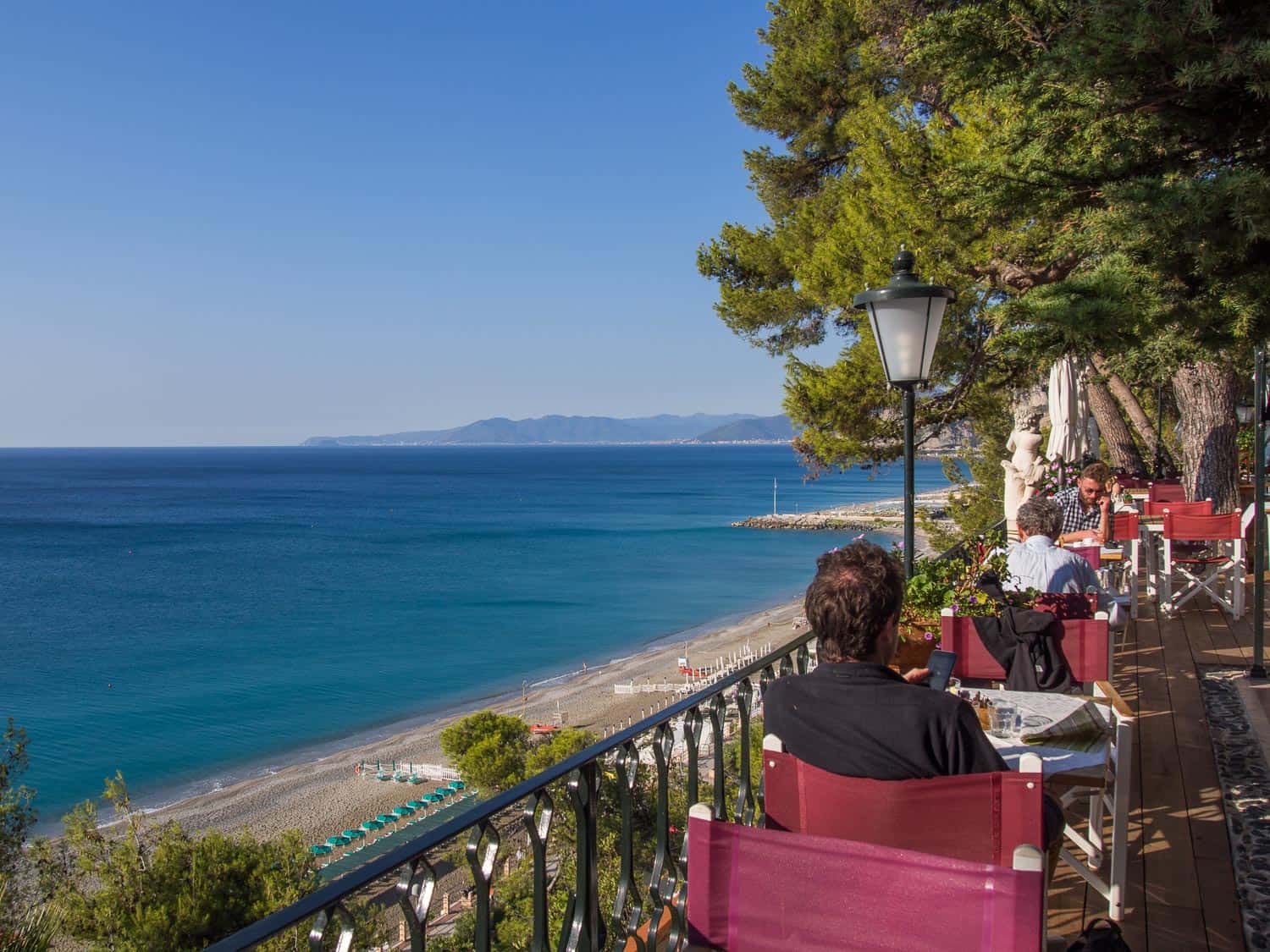 Hotel Punta Est restaurant overlooking the beach, Finale Ligure, Italy