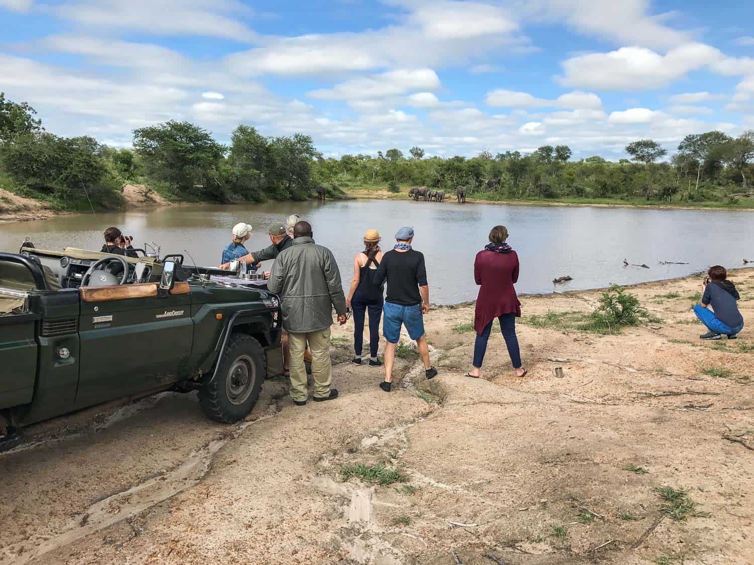 Having coffee on safari at Klaserie Sands River Camp, South Africa when elephants appeared on the other side of the dam