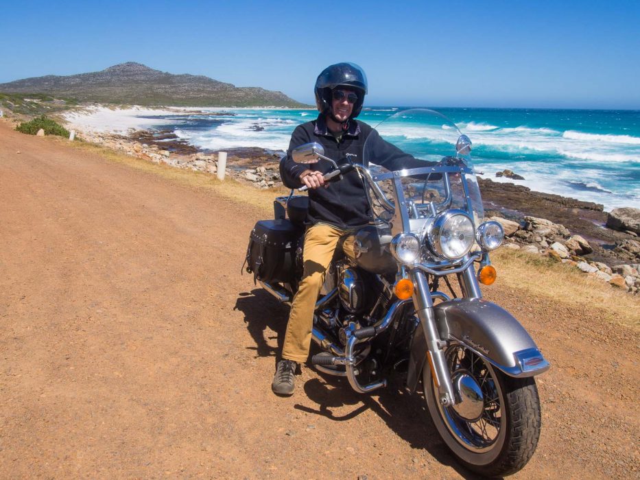 Riding the Harley along the coast near Scarborough on the Cape Peninsula drive