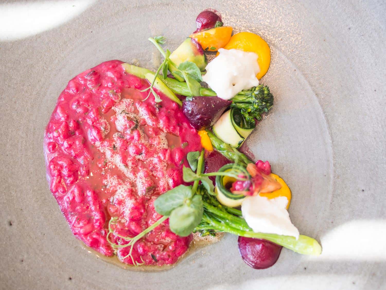 Beetroot risotto with burrata, one of the 12 dishes on the vegetarian tasting menu at La Colombe in Cape Town