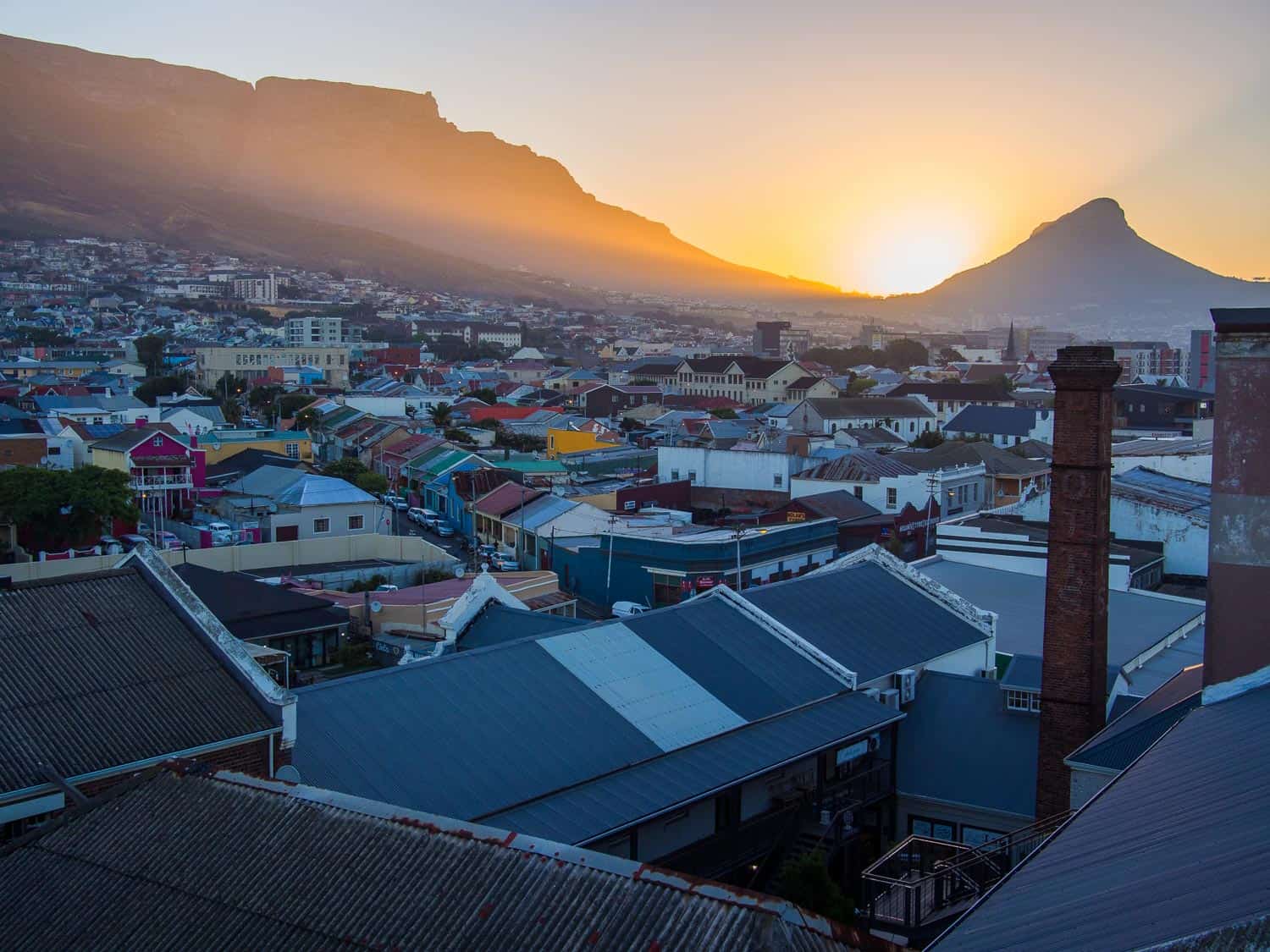 The view of Table Mountain and Lion's Head from The Pot Luck Club at sunset