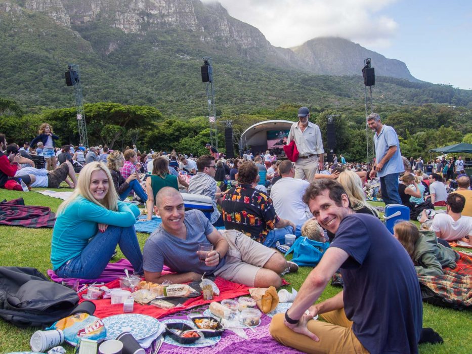 A picnic with friends at a summer concert in Kirstenbosch Garden, Cape Town
