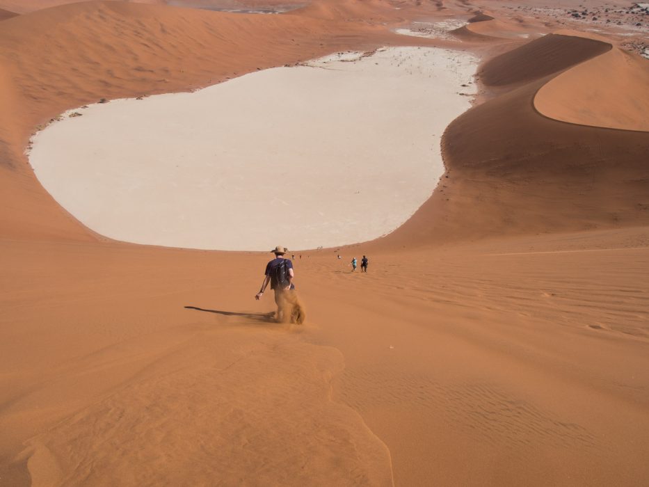 Running down the Big Daddy Sand Dune at Deadvlei in Namibia