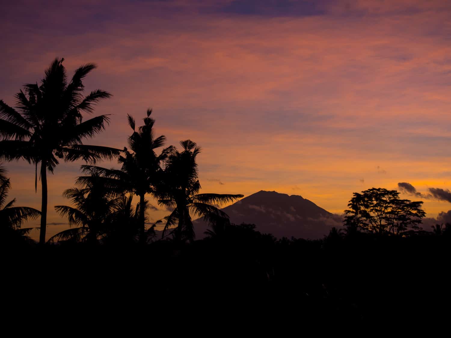 Getting an Indonesia visa extension in Ubud - sunrise volcano view.