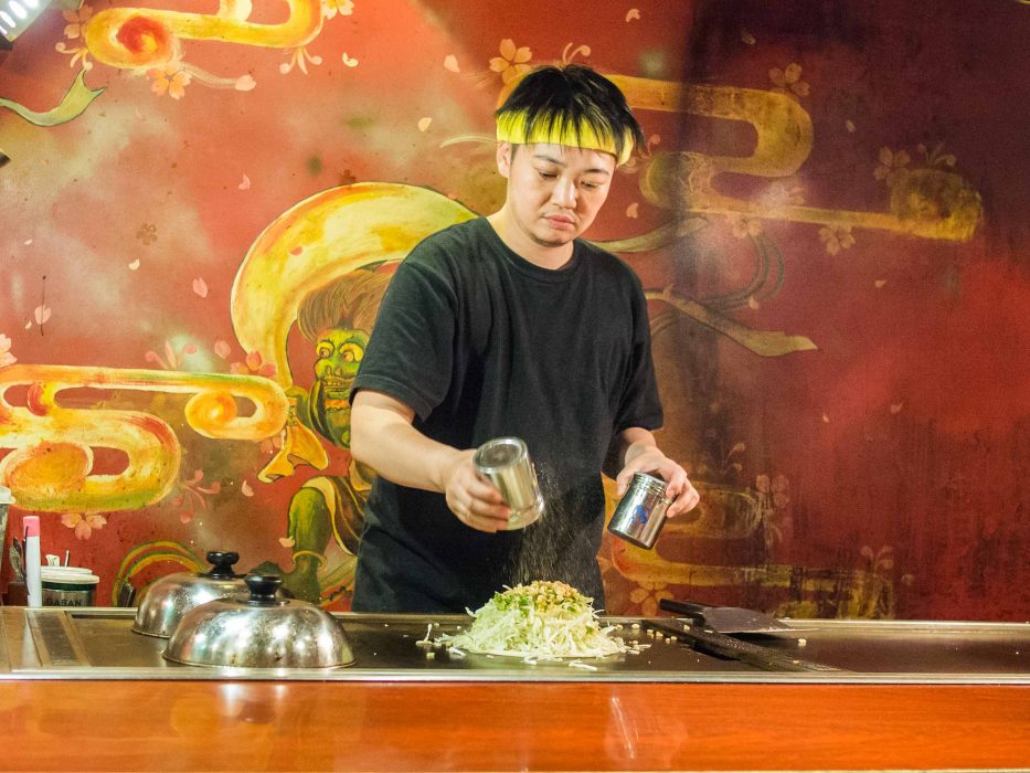 Okonomiyaki being made at Zen, a Shinjuku restaurant with vegetarian menu, Tokyo, Japan