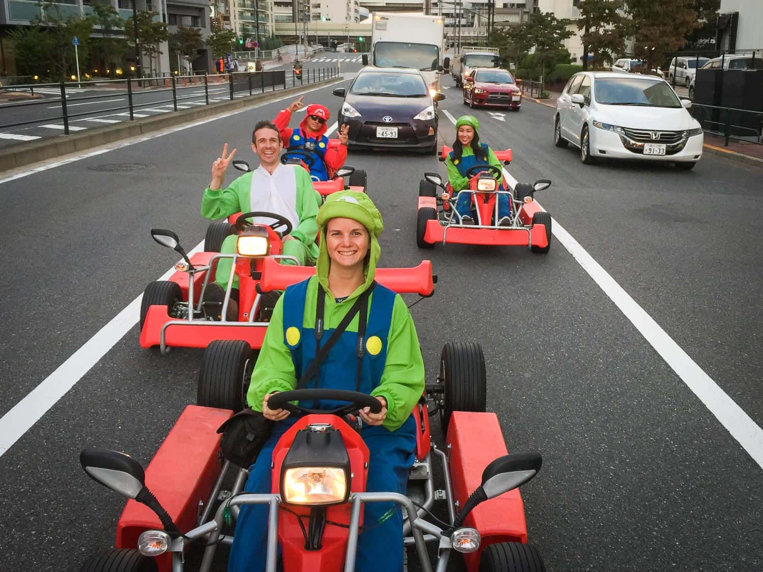 Dressing up as Mario characters and driving a Maricar go-kart is one of the many fun things to do in Tokyo