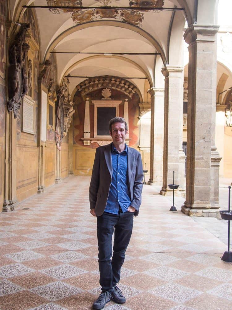 Simon in Bologna wearing the Bluffworks blazer with the Bluffworks shirt and black jeans