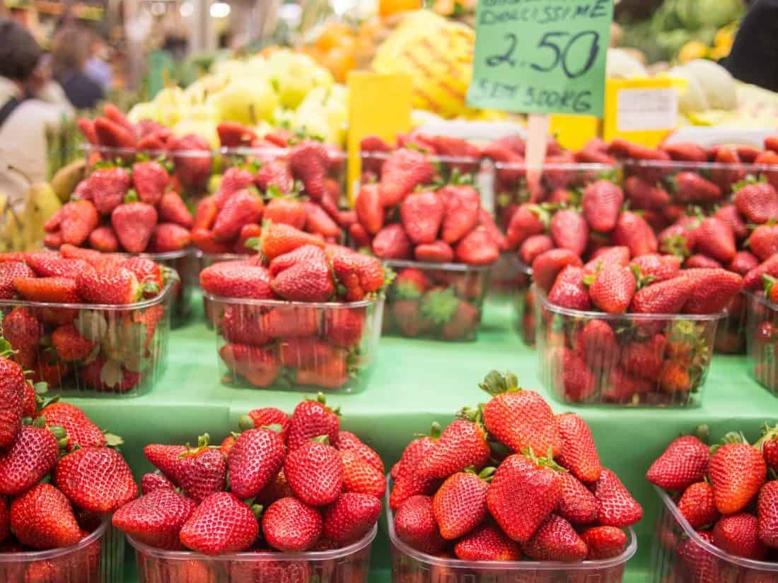 Delicious Basilicata strawberries in April at the Mercato delle Erbe, Bologna