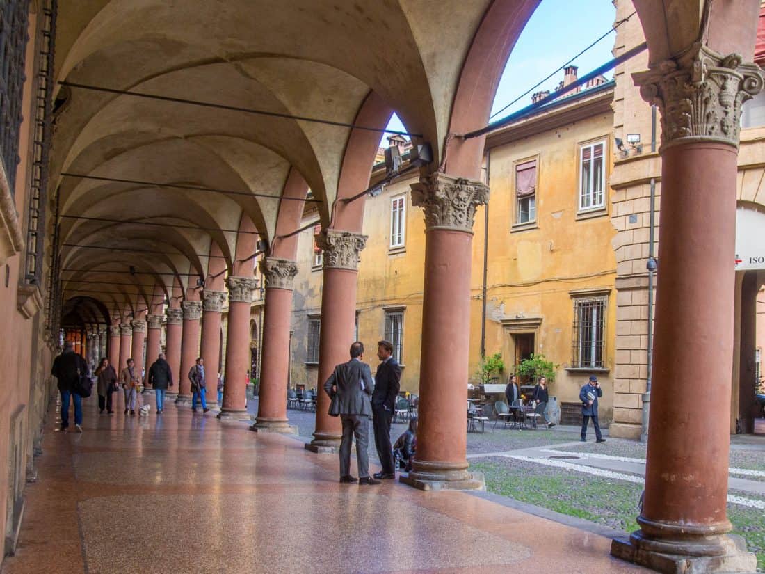 The portico along one side of Piazza Santo Stefano in Bologna