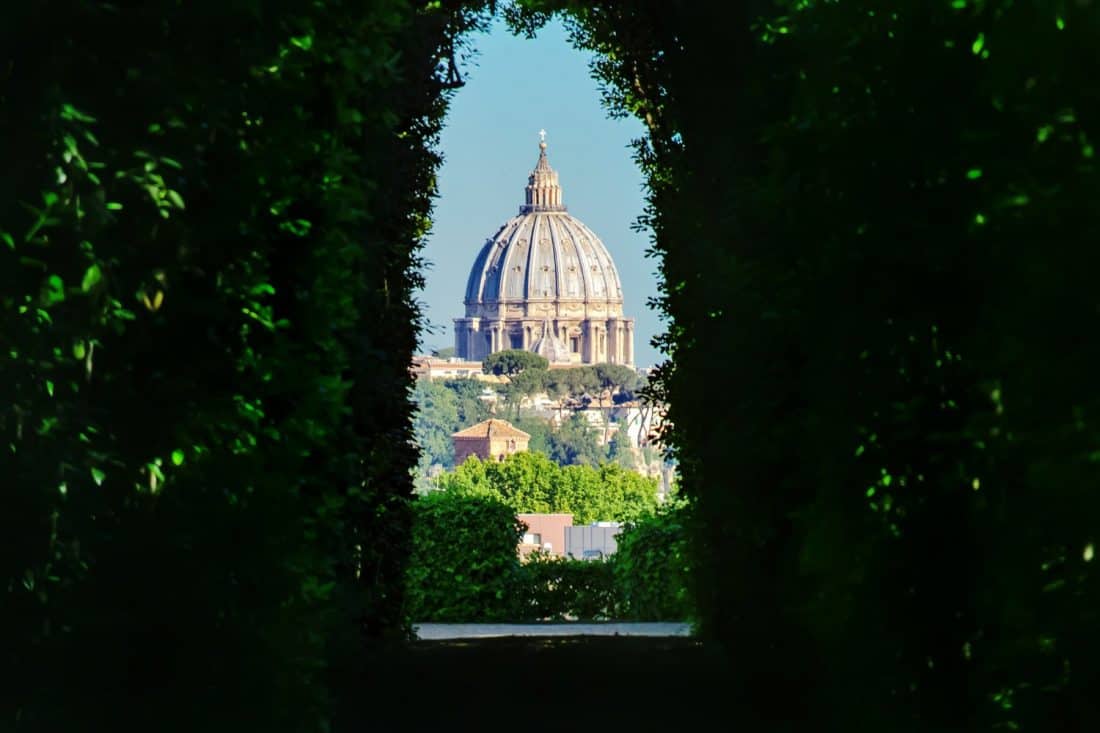 Aventine Keyhole view of St Peter's on the Aventine Hill in Rome, Italy