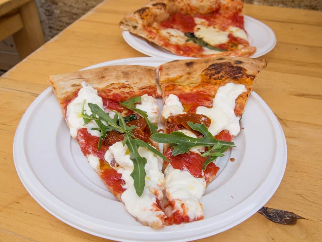 Buratta pizza and Margherita pizza slices at Pizza & Co in Lecce, Puglia, Italy